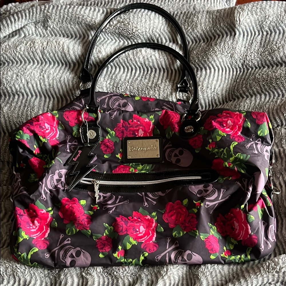 Betsey Johnson Black and Pink Floral with skulls Overnight Bag